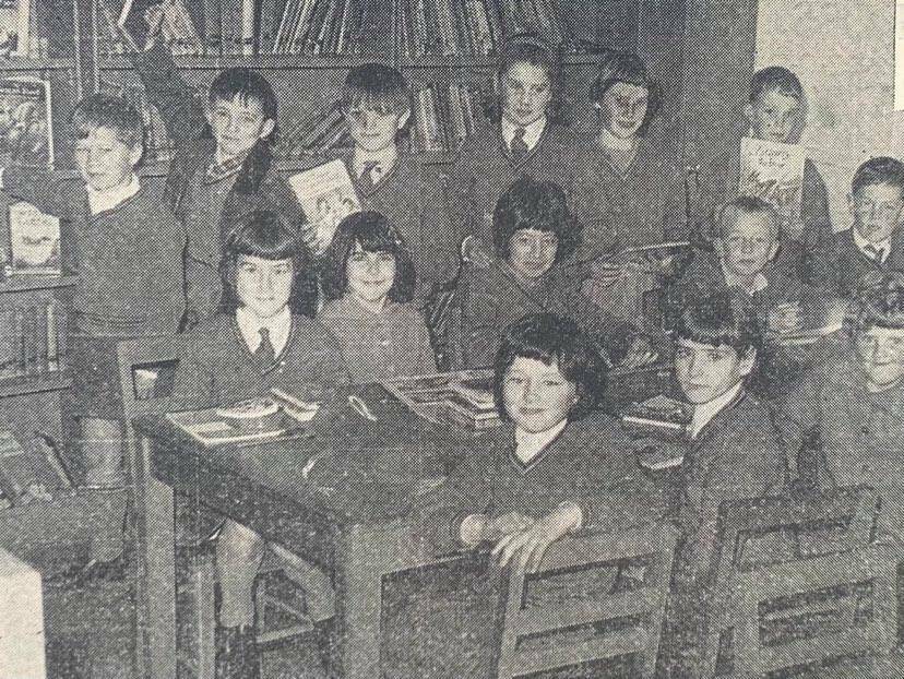 WELL READ: Port Fairy Consolidated School students in the library. 