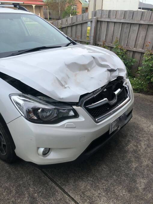 BANGED UP: The damage done to the car that ran into the kangaroo on the Princes Highway.
