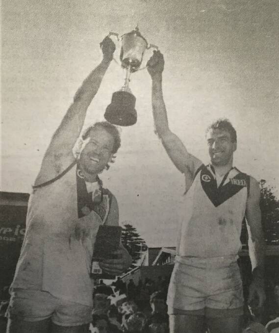 WINNERS: South Warrnambool coach Michael Pollock and captain Michael Taylor with the 1994 Hampden league premiership cup. 