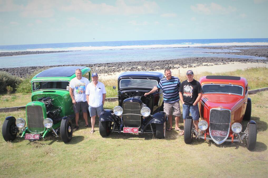 SHOWING OFF: South West Street Rodders members Paul Hutchins, Brian Watt, Trevor Fry and Tim Stone get ready for the cruise and show and shine in Port Fairy this weekend. Picture: Anthony Brady