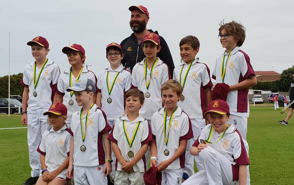 GOOD RESULT: The victorious Nestles under 11 team celebrating their win on Sunday.