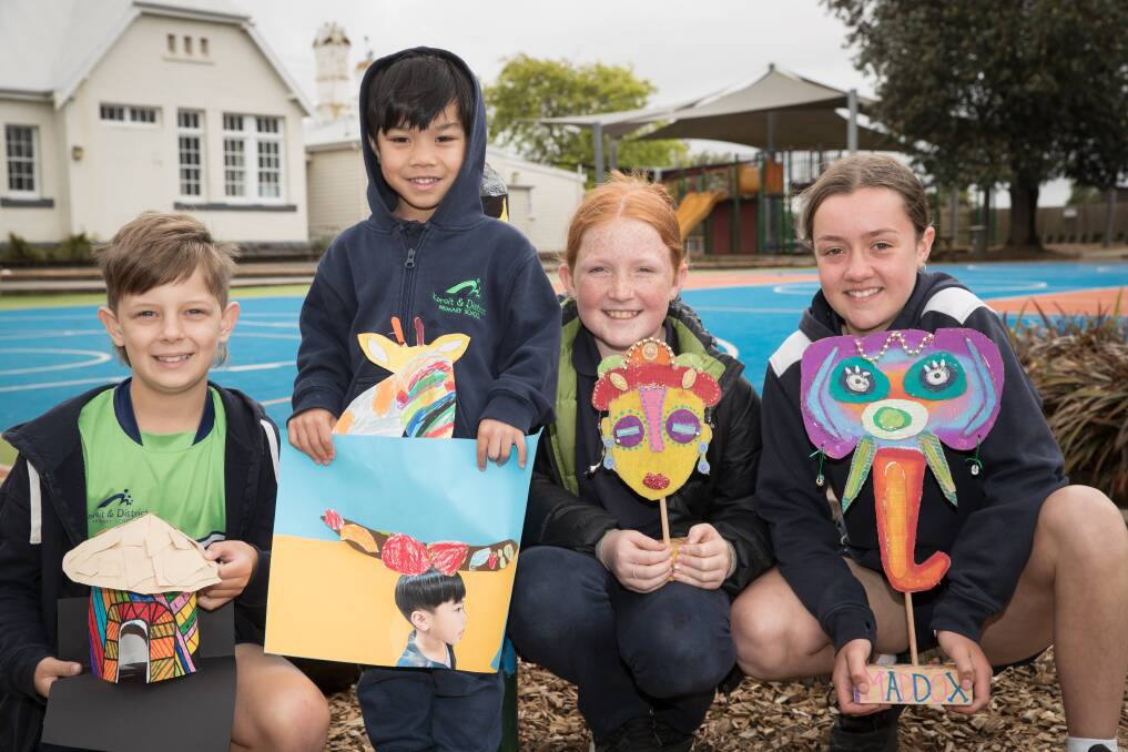 Koroit and District Primary School students Levi Gavin, Rufeo Labadan, Zara Walsh and Maddox Doherty with art work for the school concert, which has an African theme Picture by Sean McKenna.