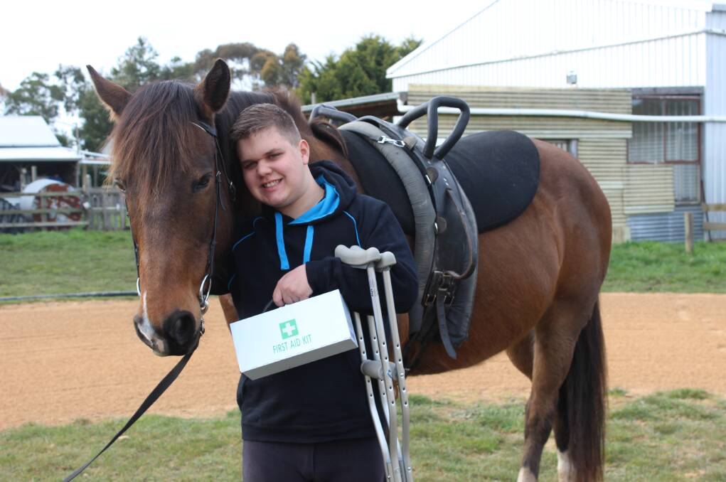 HAPPY: Ashely Holmes and his horse The Banjo Man are thrilled with the first aid funding.