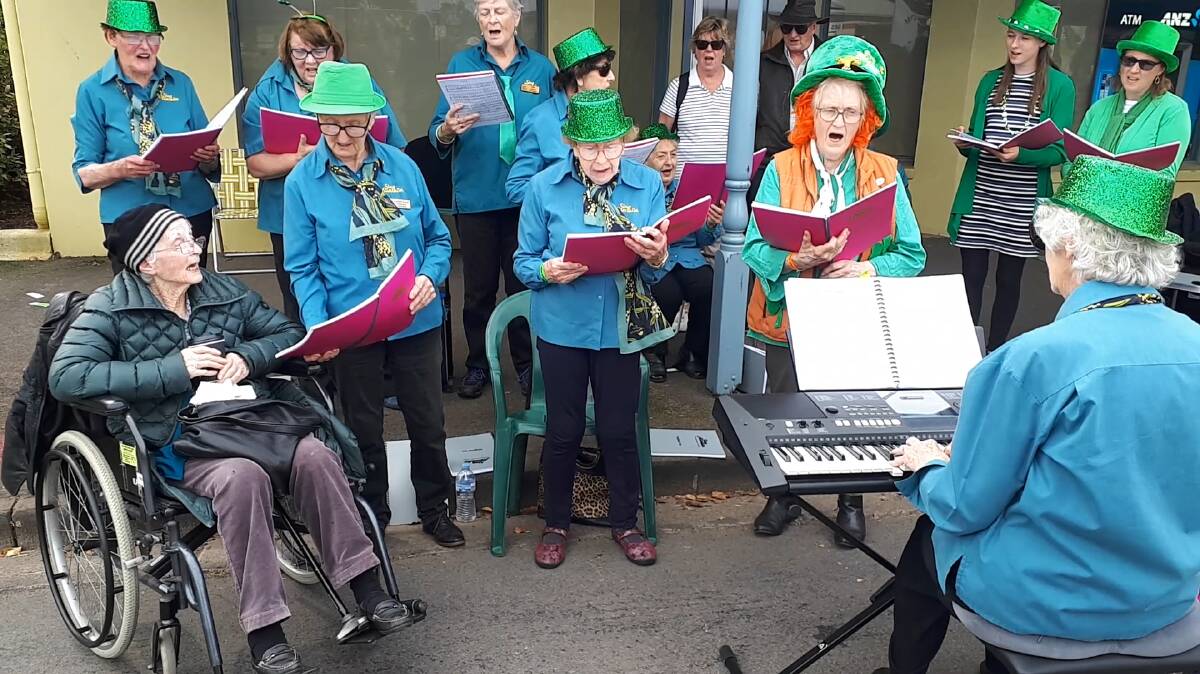 IN THE SPIRIT: Nan Leonard (in wheelchair) from Melbourne gets herself involved in the action during the 2021 Koroit Irish Festival. Mrs Leonard is Irish-born and originates from County Mayo. 