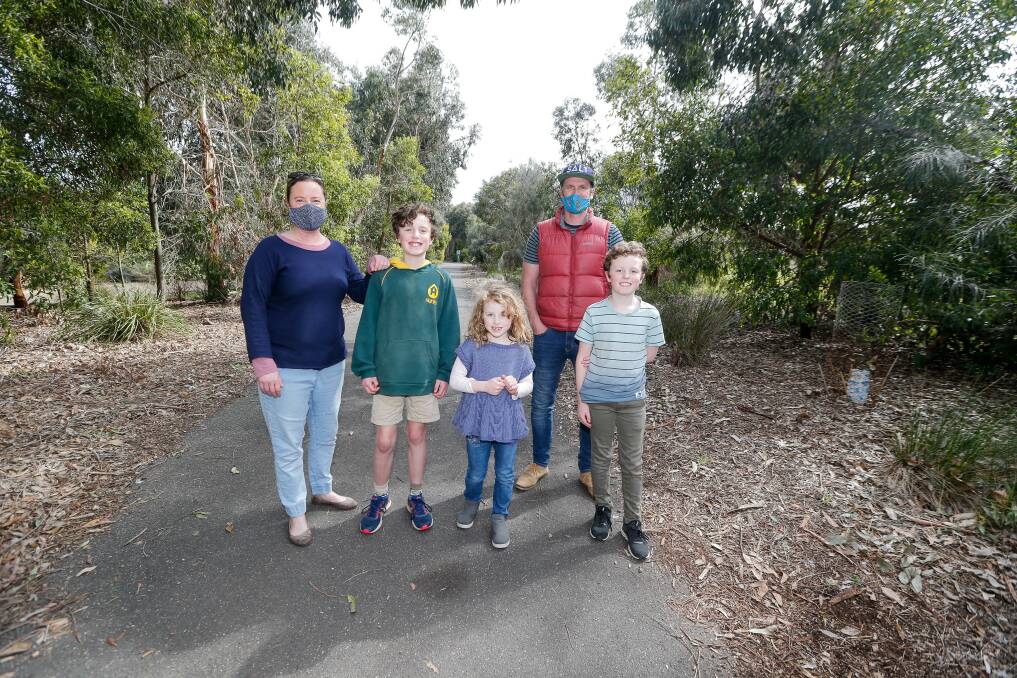 GOOD FUN: The Townsend family, Clare, Edward, Eliza, Gus and Calum, checked out the rail trail during their visit from Geelong. Picture: Anthony Brady