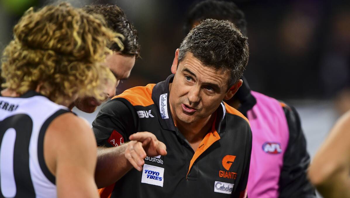 IN CHARGE: Leon Cameron passes on instructions to his GWS players. Cameron is one of the most successful football exports from the south-west.  