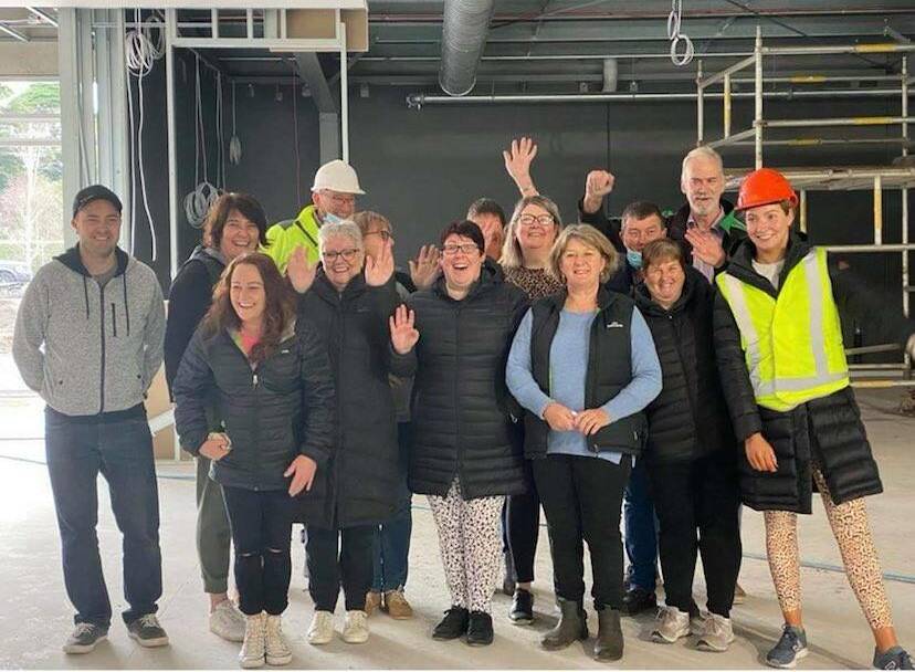 EXCITED: Staff at IGA in Koroit having a tour of the new building, which they hope will be their new work place later this year. 