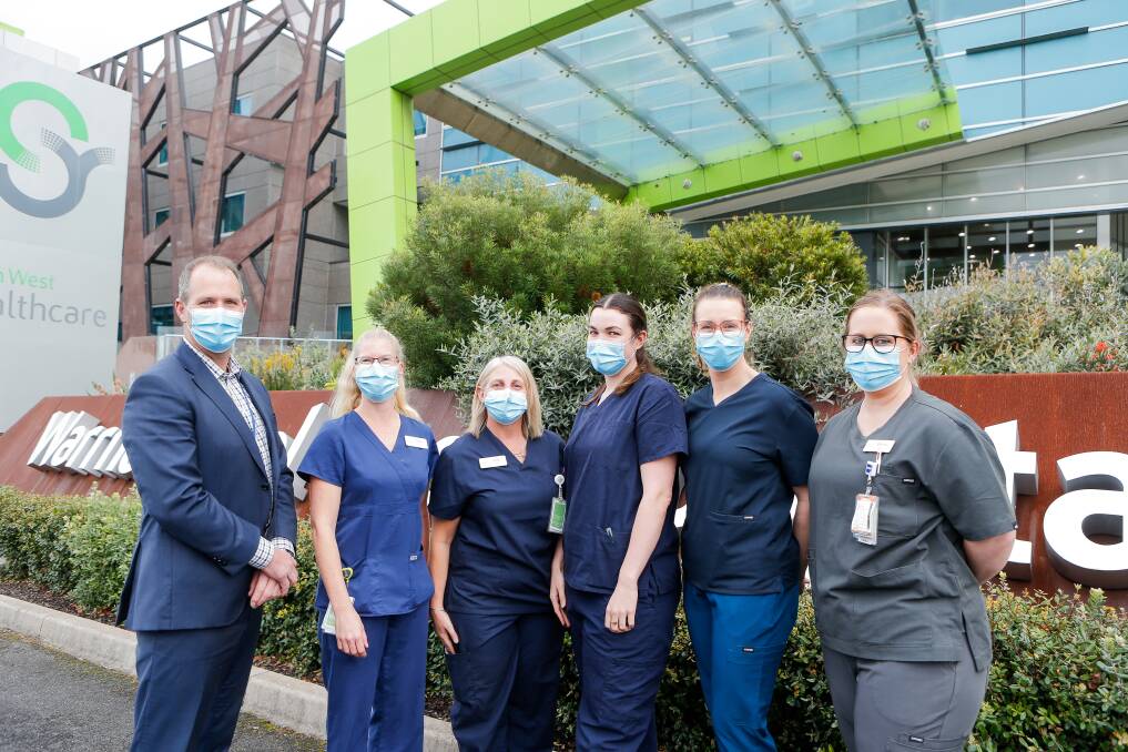 Mask up: South West Healthcare CEO Craig Fraser and nurses Erin Howman, Judy Wilde, Rachel Dobson, Lydia Richardson and Emma Baulch. Picture: Anthony Brady