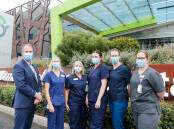 Mask up: South West Healthcare CEO Craig Fraser and nurses Erin Howman, Judy Wilde, Rachel Dobson, Lydia Richardson and Emma Baulch. Picture: Anthony Brady