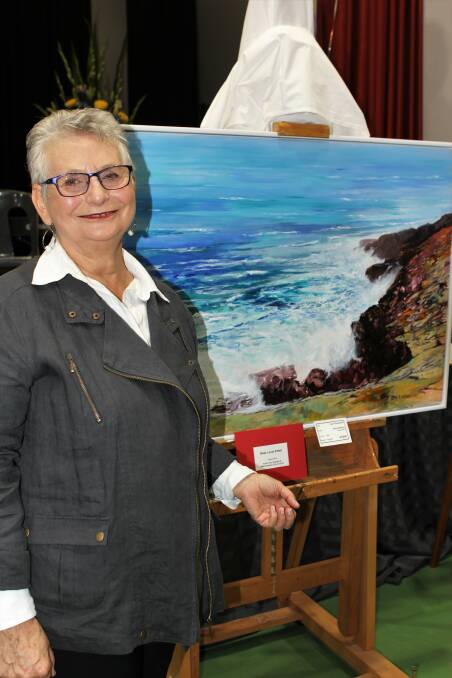 TALENTED: Winner of the best local painting at the City of Warrnambool Art Show Wilma Williams in front of her award-winning piece. Picture: Anthony Brady 
