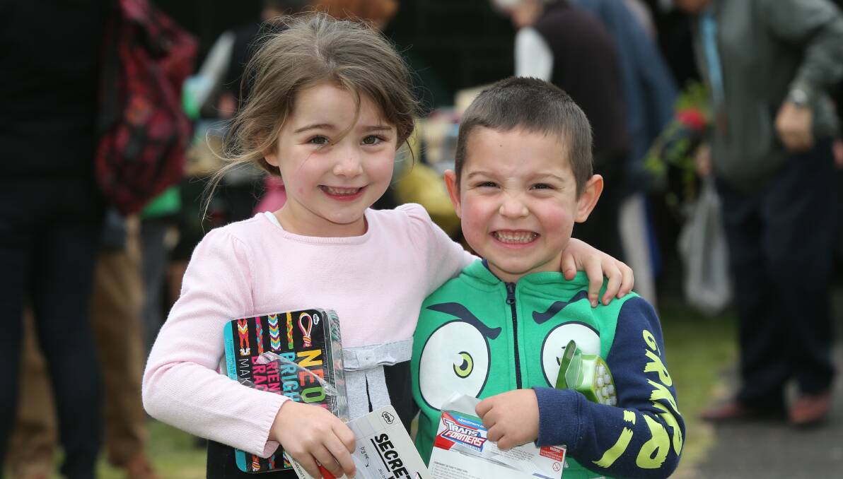 Siblings Willow, 5, and Dusty Lancaster, 3, of Port Fairy are all smiles at the Strawberry Fete. Pictures: Vicky Hughson