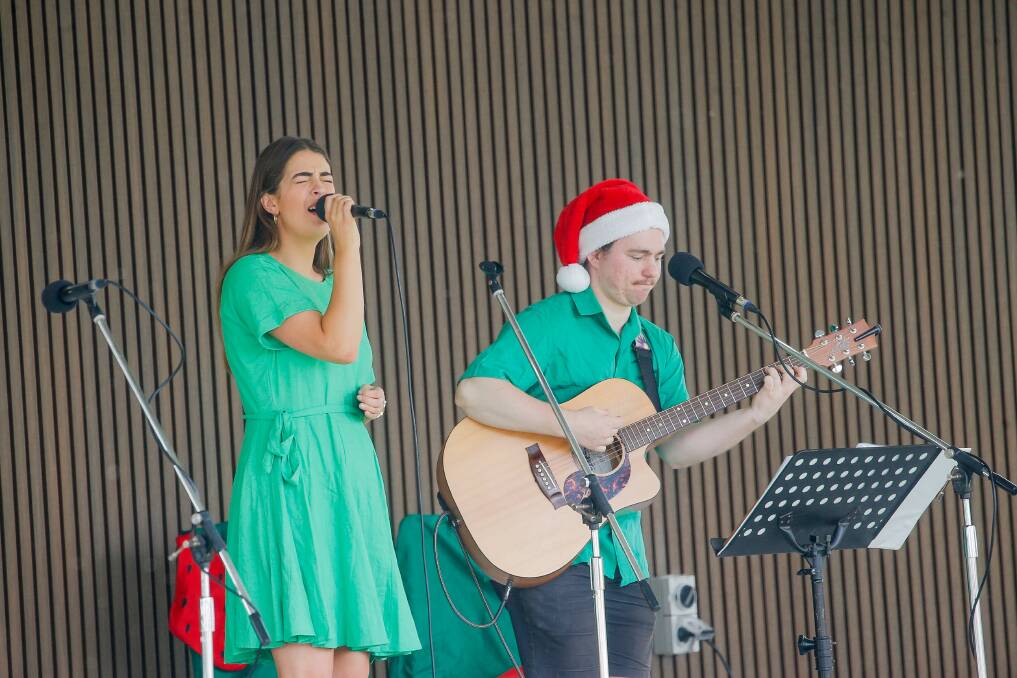 Angela Kenna and Keelan Mast performing at the Koroit Carols on the new stage at the Village Green. Picture by Anthony Brady