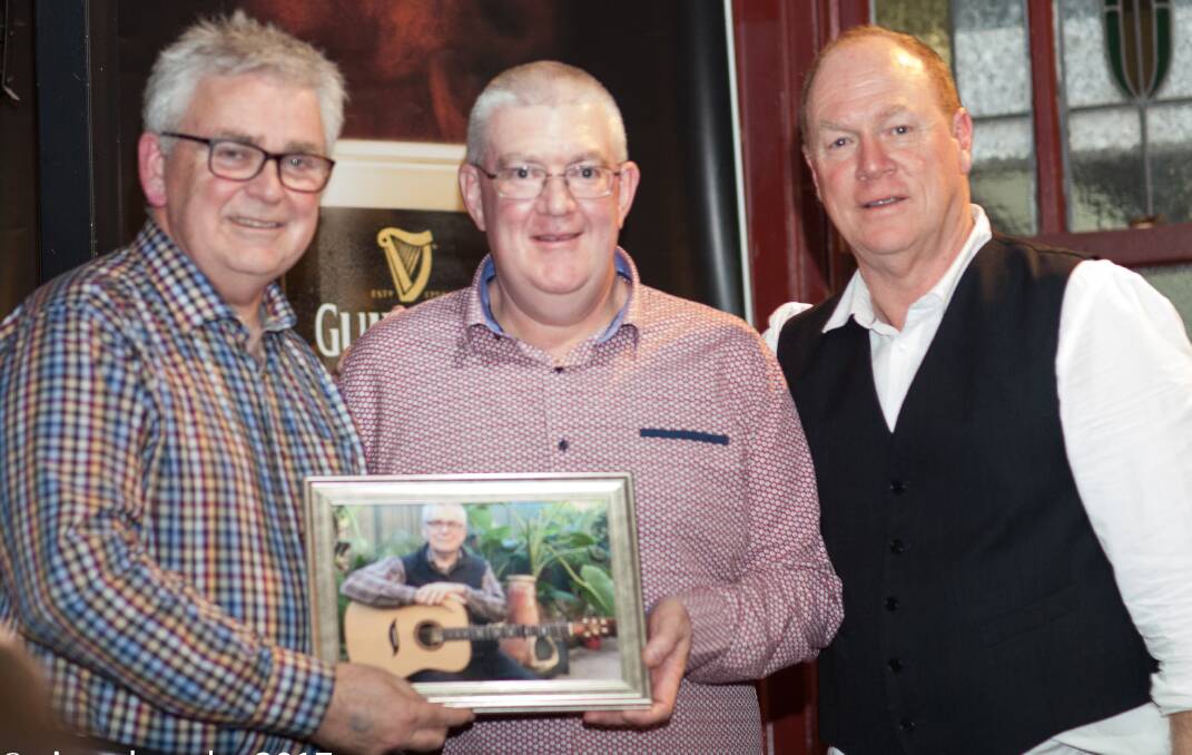 AWARD: Legend of the Lake Geoff McArthur with Koroit Irish Festival preisdent Chris Evans and Lake School director Felix Meagher on Saturday night. Picture: Vince Brophy