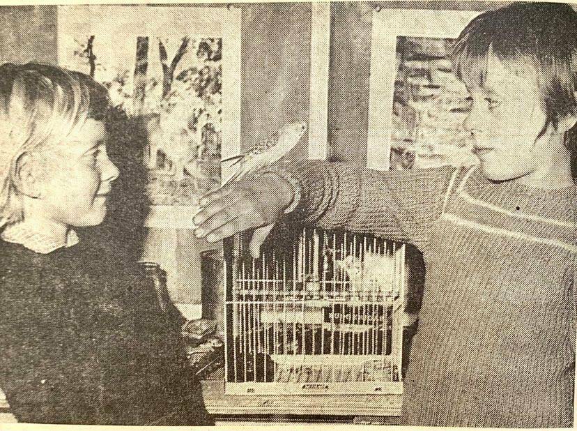 MATES: Cecilie Osborn and Elaine Stokes from Kirkstall Sate School with budgie Bluey. 