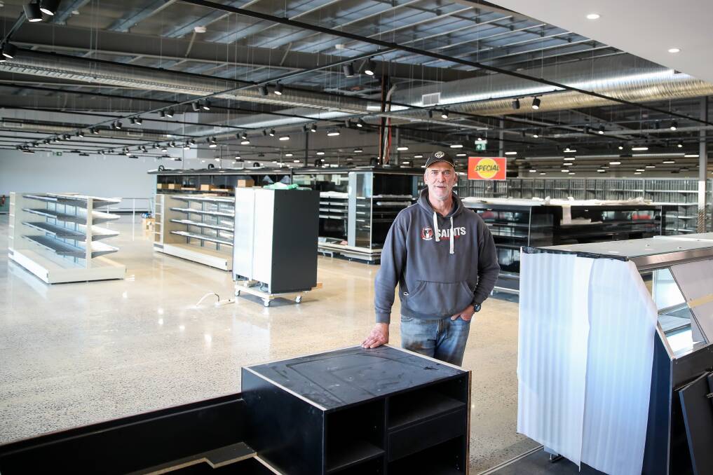 PROGRESS: Mick Daly inside the new Koroit IGA supermarket that is getting close to completion. The supermarket is being done mainly with local tradespeople but with materials from across the globe. Picture: Morgan Hancock.