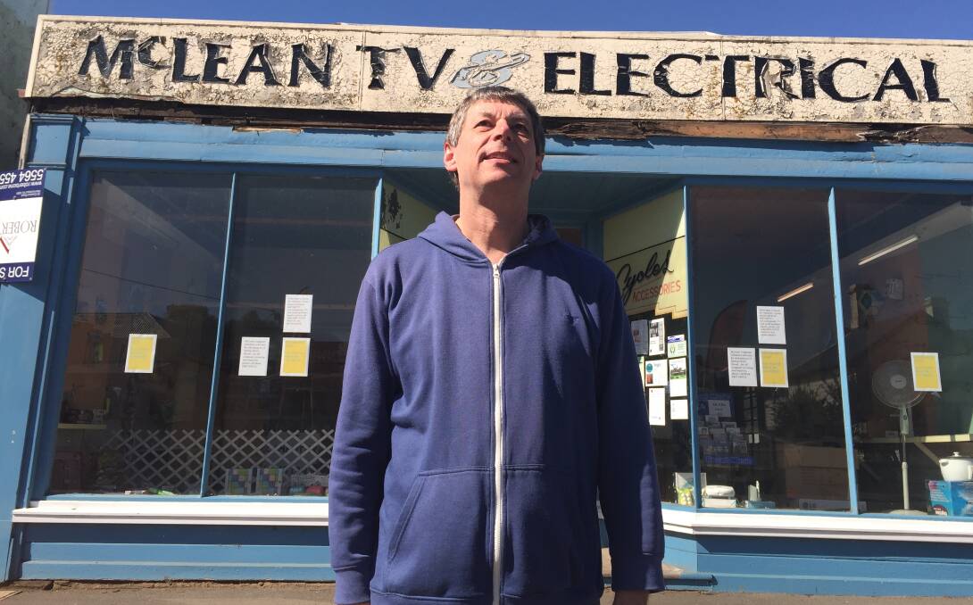 CHANGE: Brad McLean from McLeans Electrical in Koroit ponders the new look for his shop. A truck clipped the building last Friday.