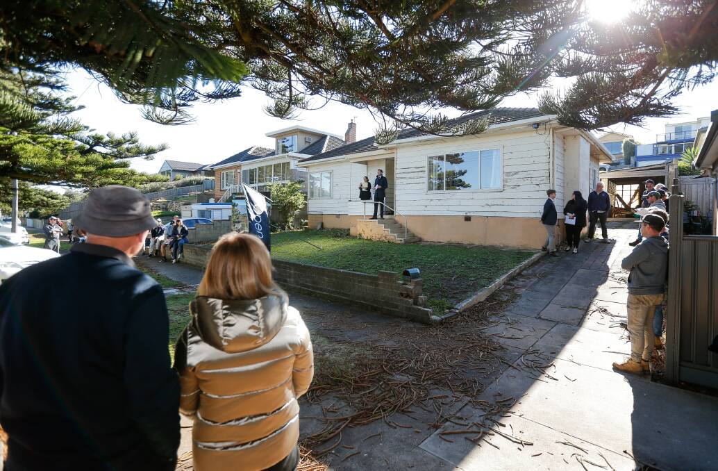 FOR SALE: Danny Harris from Harris & Wood Real Estate auctions a house in Timor Street on Saturday morning. The house sold for higher than expected. Picture: Anthony Brady
