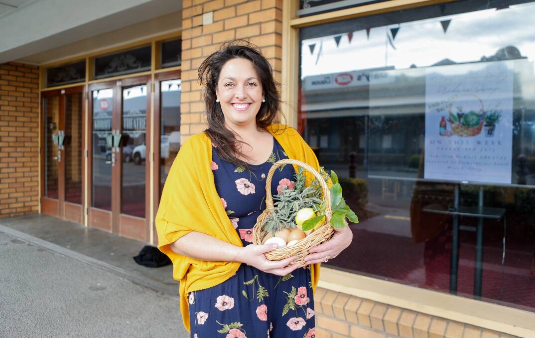 ALL SMILES FOR A PRODUCTIVE DAY: Cassie Carroll from the Koroit Community Produce and Plant Swap. Picture: Anthony Brady