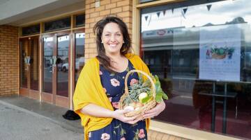 ALL SMILES FOR A PRODUCTIVE DAY: Cassie Carroll from the Koroit Community Produce and Plant Swap. Picture: Anthony Brady