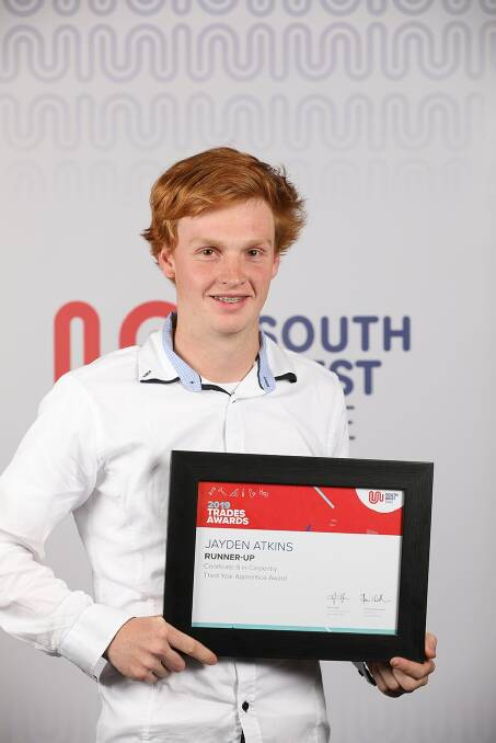 REWARD: Jayden Atkins with his runners-up award from South-West TAFE last year.