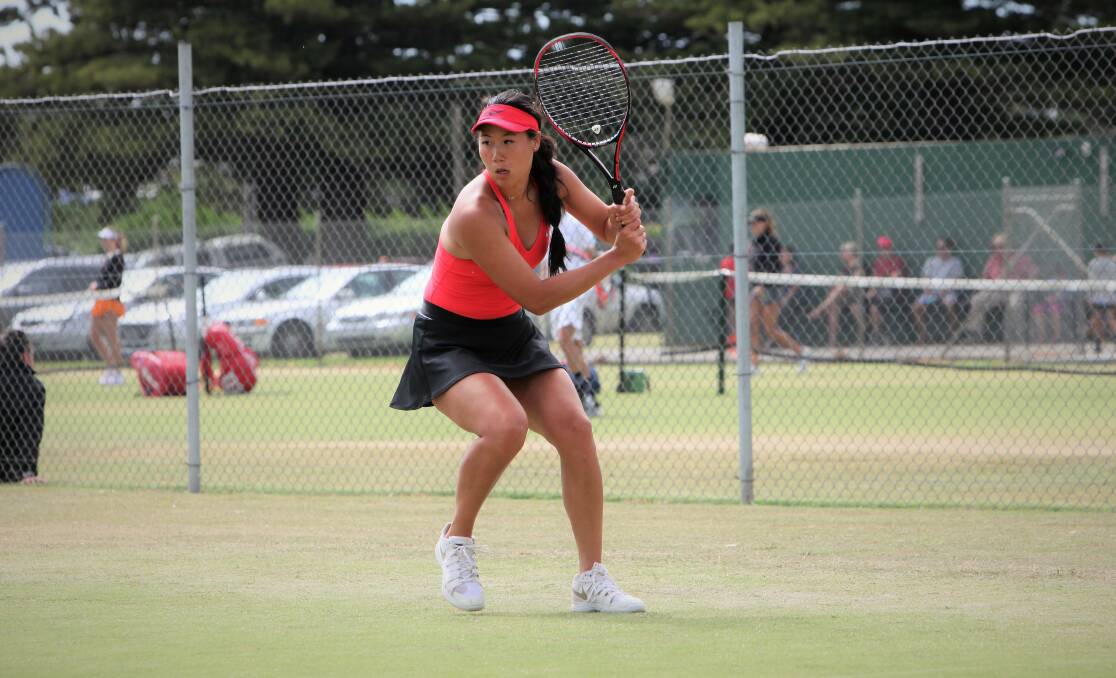 EXPLOSIVE: Mary Ann Liu gets ready to play a backhand shot during her win in the women's AMT Tournament final on Monday at the Warrnambool Lawn Tennis Club. 