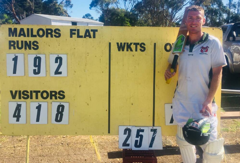 MAMMOTH EFFORT: Killareny's Brendan Chatfield in front of the scoreboard. He blasted a career-high 257 on Saturday.
