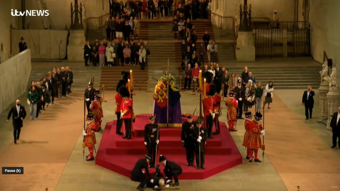 There were dramatic scenes during Queen's vigil as a guard collapsed while on duty at the Queen's coffin in Westminster Hall. Video by BBC