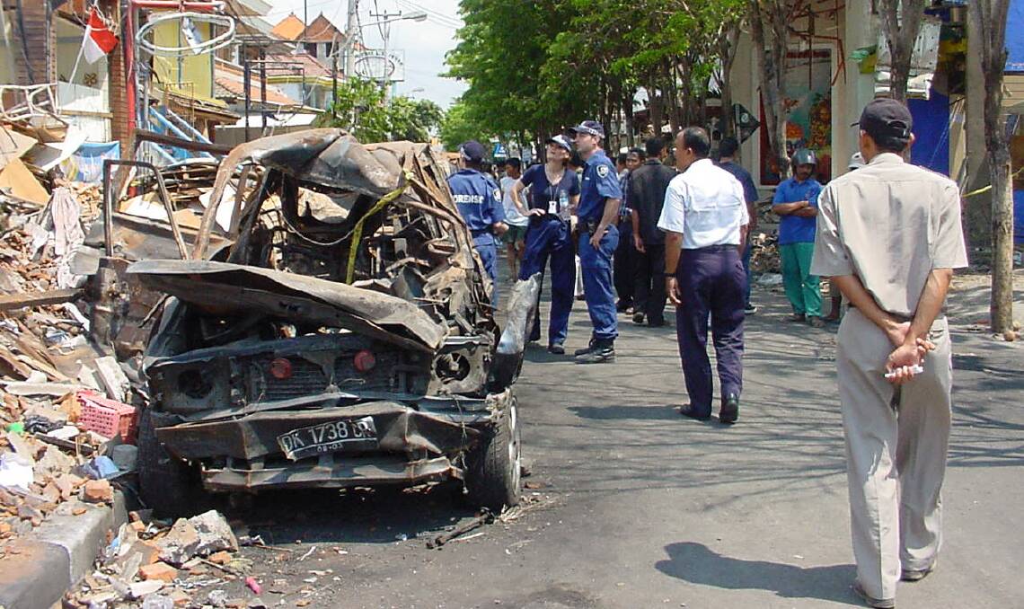 Ground zero in Kuta following the two blasts. Picture by the AFP