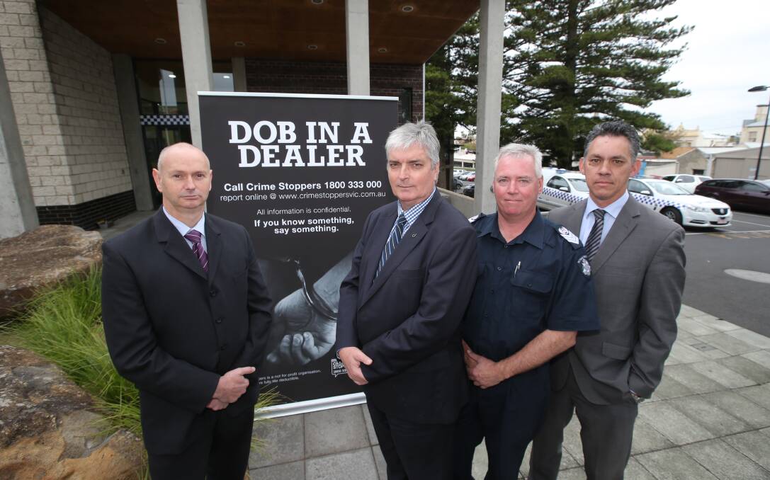 LAUNCH: Detective Sergeant Sean Halley, Crime Stoppers' Peter Brown, Senior Sergeant Shane Keogh and Michael Neoh at the 2015 launch. 