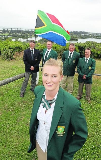 Leani Van Dyk,  pictured with teammates, is the first female South African  shooter to  contest the titles.  091118AM60   Picture:  ANGELA MILNEclay target came out to the 31st world fitasc sporting championshipsShe is pictured with team mates.pictured in the back ground are her team mates.