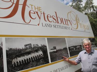 Author Ken Unwin with signs at the Simpson historical park that detail the history of the Heytesbury settlement.100205eh02