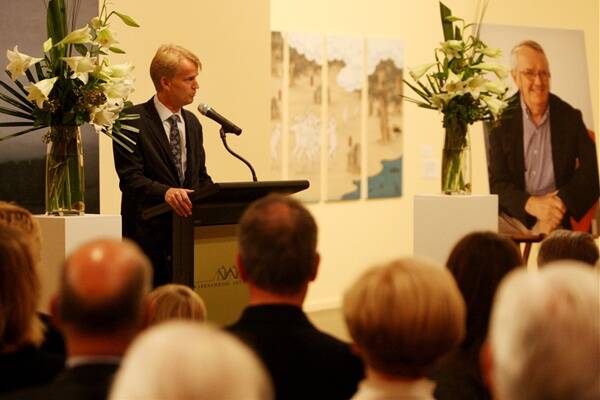 David Jones Jnr speaks about his father at a memorial service at the Warrnambool Art Gallery.  