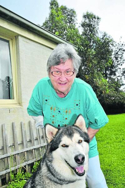 A dog-lover still: Mrs Bonic with her pet husky Brandy.