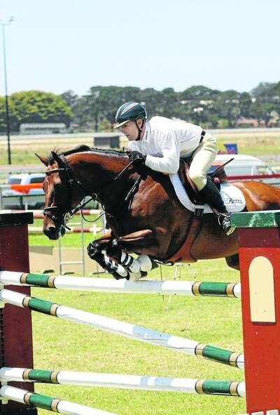A grade winners Greg Smith and Henry Higgs in fine form at the Shipwreck Coast Showjumping Championships in Warnnambool yesterday. PIC: Damian White