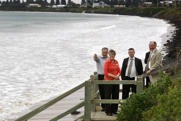Inspecting the sea wall at East Beach are (from left) Moyne Shire councillors Colin Ryan and Jill Parker, Environment Minister Ryan Smith and Moyne's sustainable development director Oliver Moles.