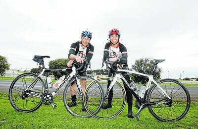 Mark Powell (left) and Jason Hill have ridden their bikes from Adelaide to Warrnambool.