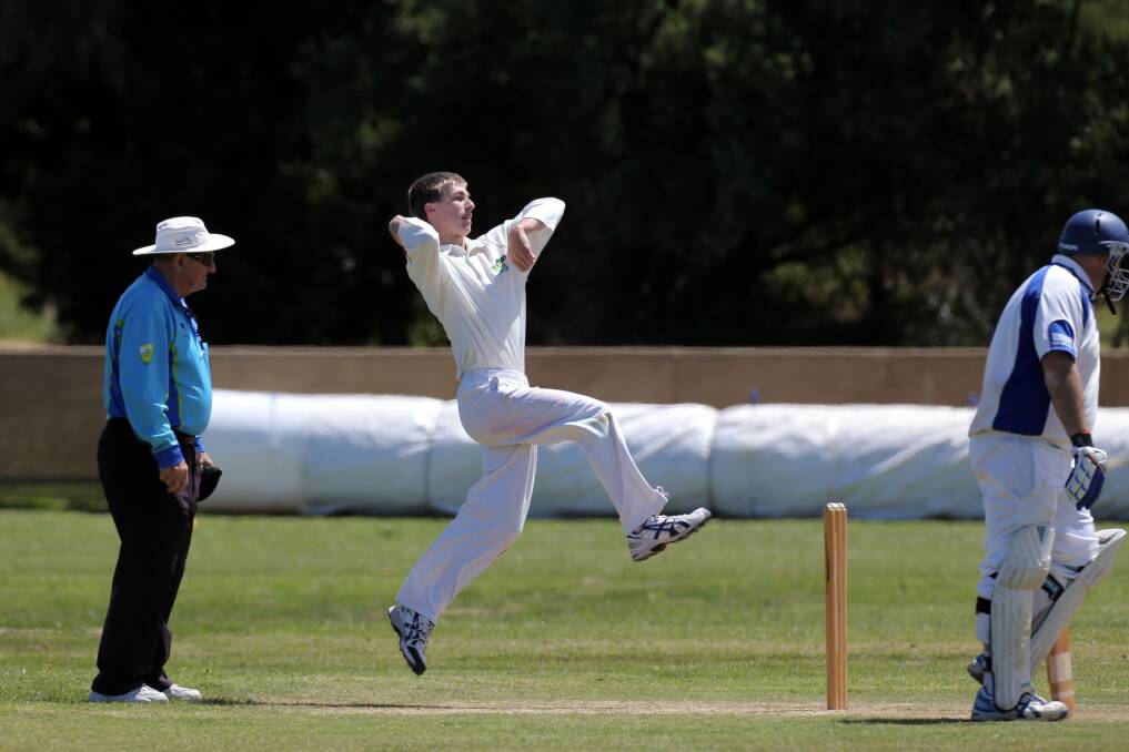 Allansford bowler Josh Parsons winds up as Creek batsman Paul Walker readies to run.