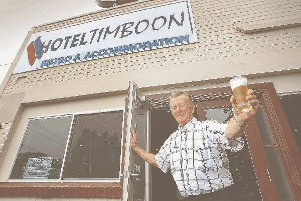 Hotelier Graeme Welsh is delighted to get beer flowing again at Hotel Timboon. 081212GW01Picture: GLEN WATSON