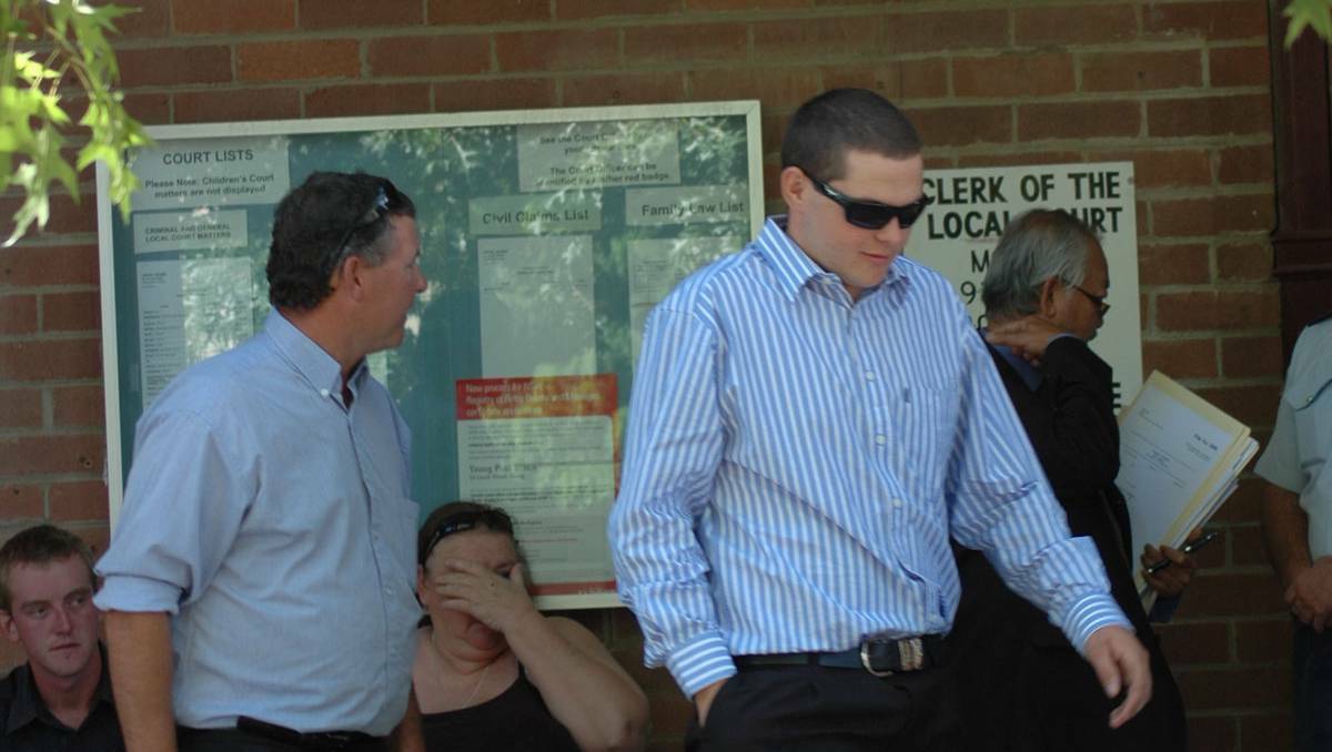 Simon McIsaac (right) seen leaving the Young Local Court along side his father Dean (left) after having his case adjourned.