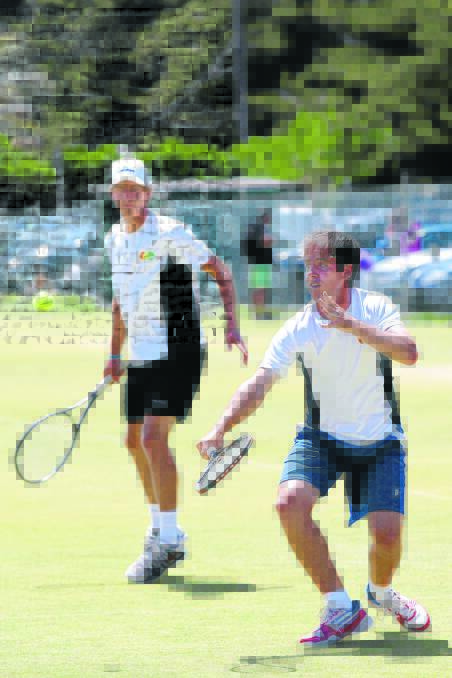 Matt Moloney makes a volley during yesterday’s decisive men’s doubles final victory with Warrnambool playing partner Jake Dunn, whom Moloney coached as a junior. 