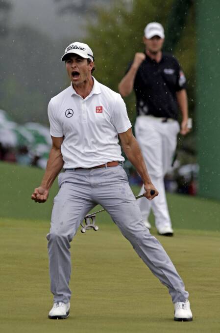 One of Australian Masters champion Adam Scott’s favourite things from Augusta, the picture of fellow Aussie Leishman cheering him on on golf’s biggest stage. Picture: AP