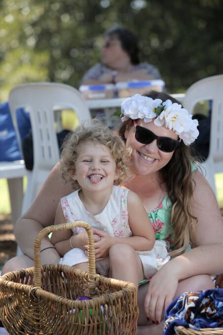 Mia Louden, 3, relaxes to the tunes of jazz in the park with her aunty Sarah Brown, of Kirkstall.