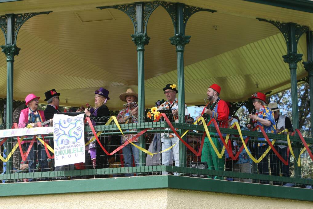 The Warrnambool ukulele group performs during the 100th anniversary celebrations of the botanic gardens rotunda. 