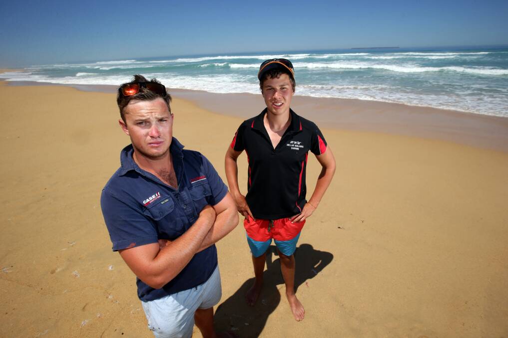 Shaun Bloomfield (left), from Balmoral, and Sam Young, of Colac, were yesterday back at the scene of their heroic rescue of two Russian tourists at Yambuk beach on Monday night. 