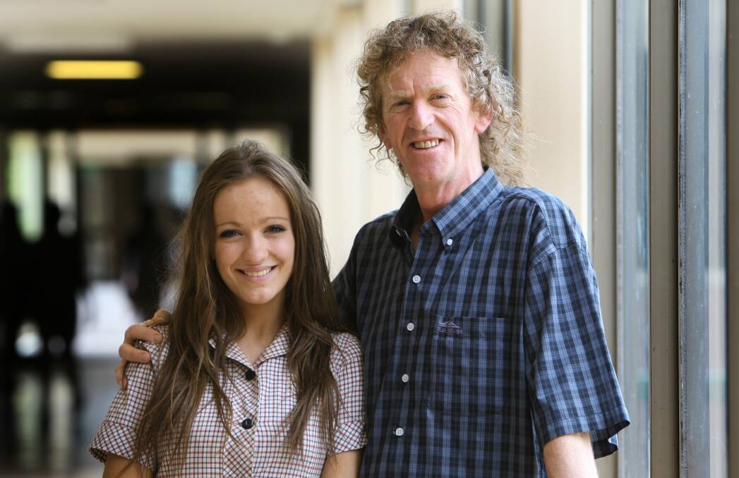 Brauer College teacher Paul McFadden with his daughter Holly, 17.