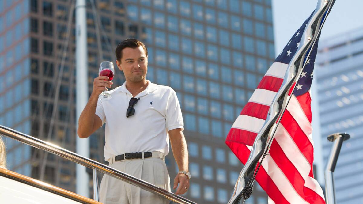 DiCaprio salutes the good life in The Wolf Of Wall Street.