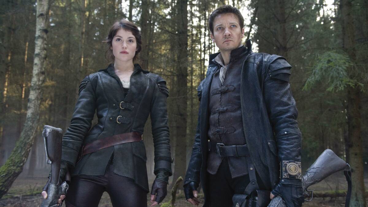 Gemma Arterton and Jeremy Renner load up on guns in Hansel & Gretel: Witch Hunters.