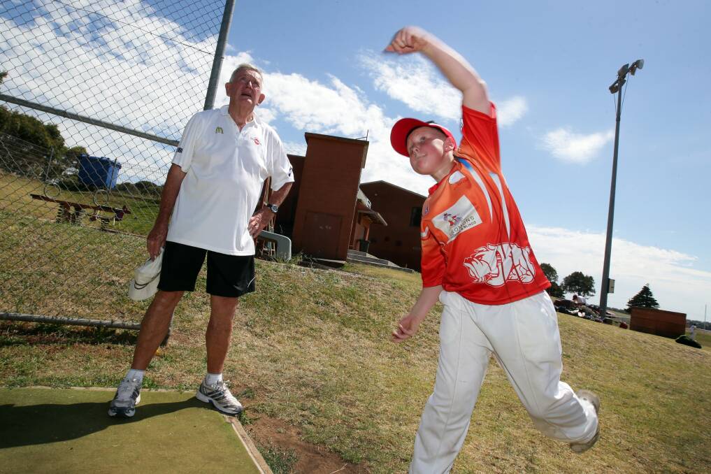 Former Australian Test player Keith Stackpole watches left arm leg spin bowler Tyson Smith, 12, from Warrnambool, as he bowls for Dennington’s under 13 team. 