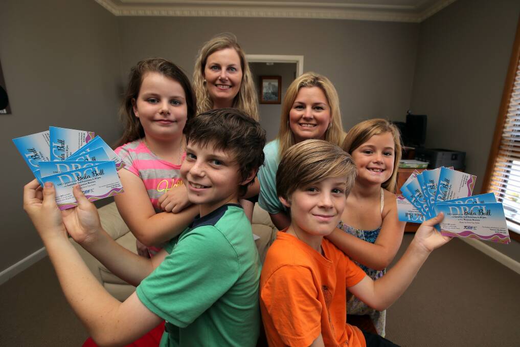 Ryan Buhlman, 11, and Ethan Wastell, 9, (front), along with Macey Buhlman, 8, Vanessa Buhlman, Stacy Wastell and Riley Wastell, 7,  hope a gala ball will raise $4000 for diabetes. 