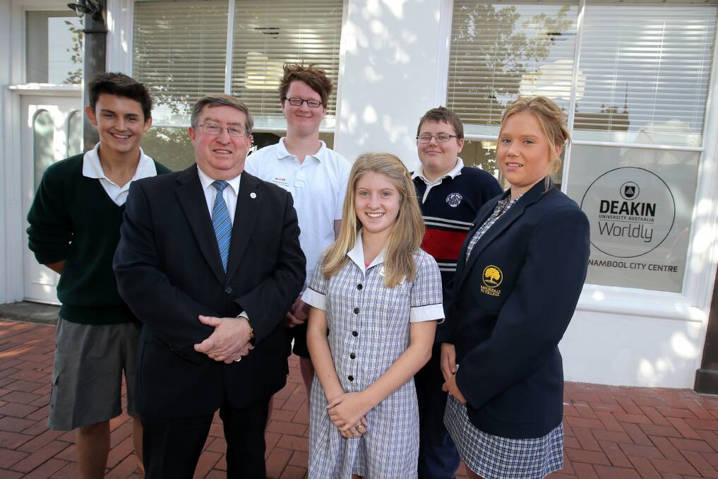 Deakin University’s Professor Greg Wood is pictured with some of the students taking part in the Beacon program: Mason Fagan, 15, (left) from Mortlake, Daniel Pugh, 15, from Terang, Laura Ladhams, 15, from Colac, Cameron Hodge, 15, from Heywood, and Porcha Smith, 16, from Hawkesdale. 